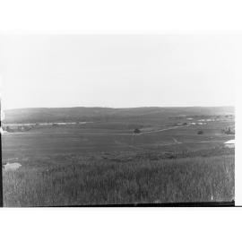 Rural view of Happy Valley - trees and farmhouse in distance