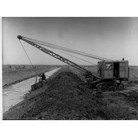 Excavator working for sewers department at Dry Creek