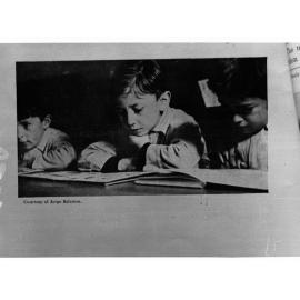 Pages in a Book Showing a Boy Reading a Book