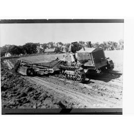 Tractor ploughing field