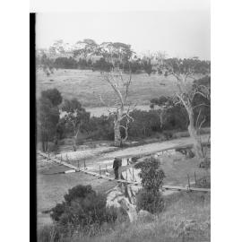 Man and Dog on Bridge at Victor Harbor