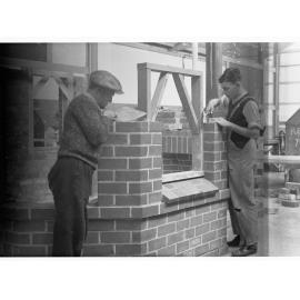 Education Department Trade School showing students doing brickwork