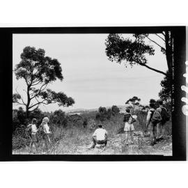 National Fitness Council - people with backpacks standing on hill