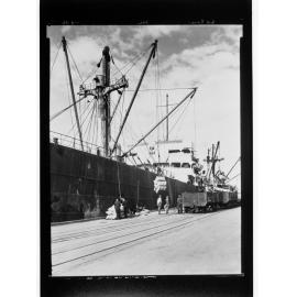 Port Pirie - goods being loaded/unloaded onto ship by crane