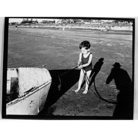 Young boy playing on beach