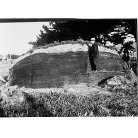 Men Standing by Haystack