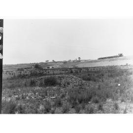 Happy Valley Waterworks - men working on digging of pipeline