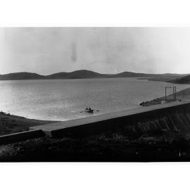 Reservoir Showing Two Men in a Row Boat