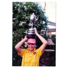 Amy Gillett with netball championship medal