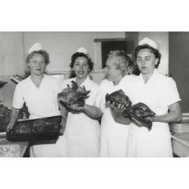 Kitchen staff at Glenelg Hostel.