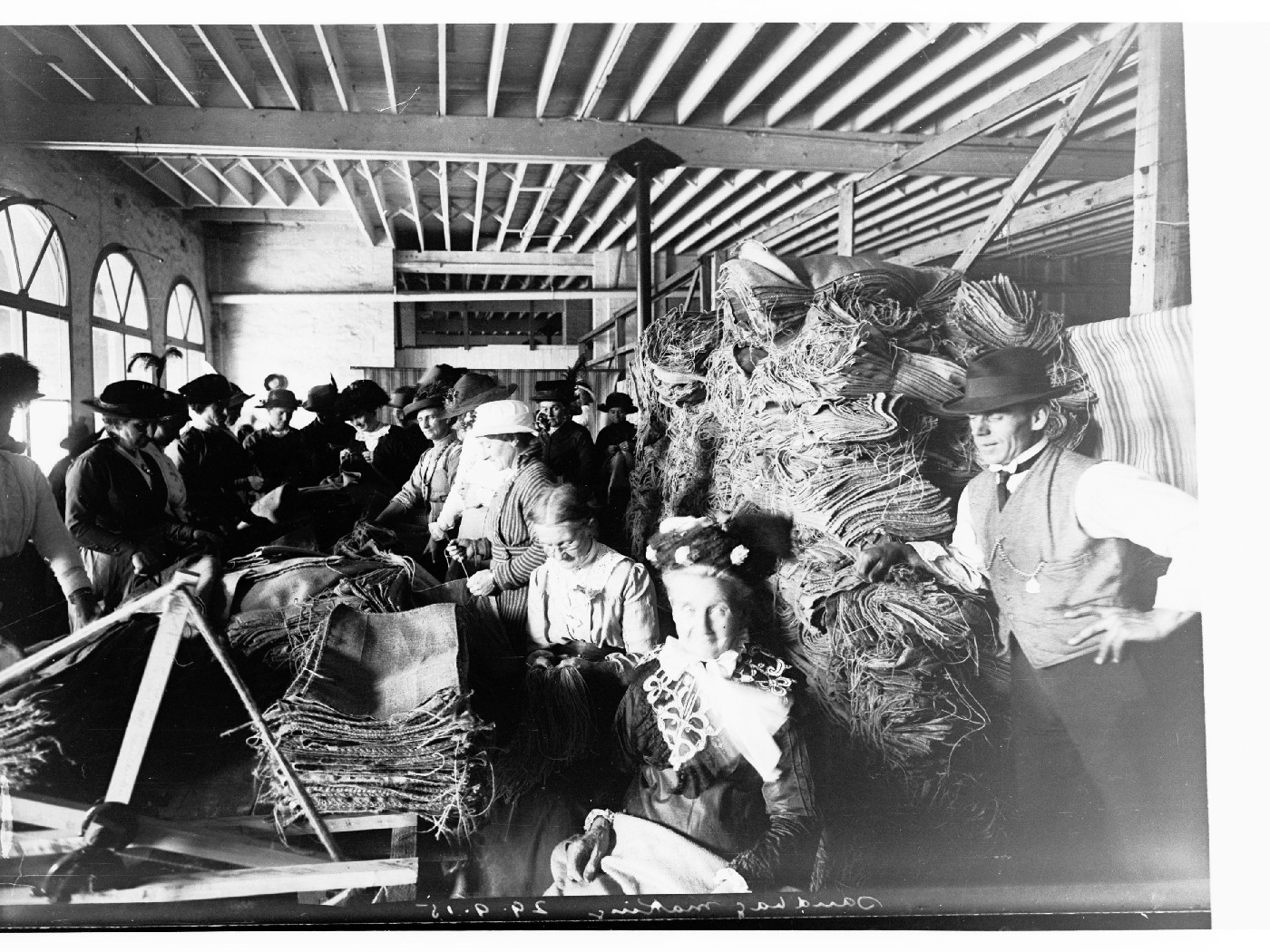 Women making sandbags for the war effort, 1915.